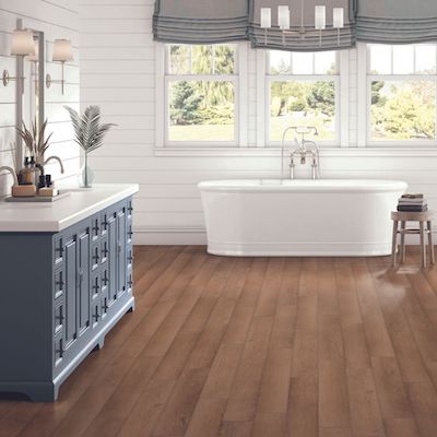 luxury vinyl plank flooring in a Switz City rustic bathroom