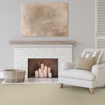 beige carpets in a monochrome Switz City living room with white brick fireplace